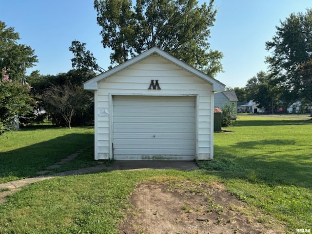 garage with a yard