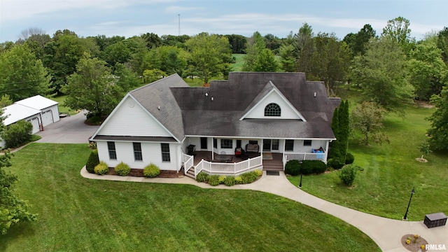 view of front of house featuring a front lawn and a porch