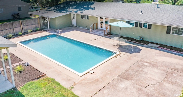 view of pool featuring a patio