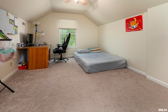 carpeted bedroom with ceiling fan and vaulted ceiling