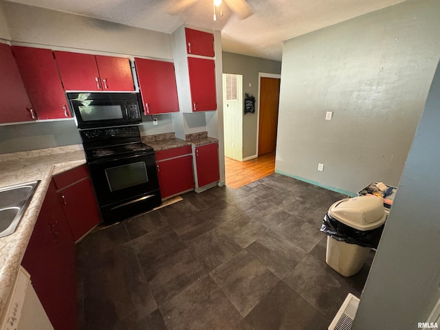 kitchen with black appliances and ceiling fan