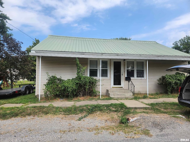 bungalow-style home featuring covered porch