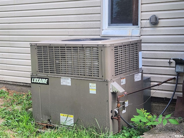 exterior details featuring cooling unit