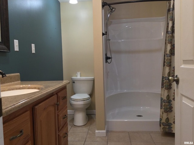 bathroom featuring curtained shower, tile patterned floors, toilet, and vanity