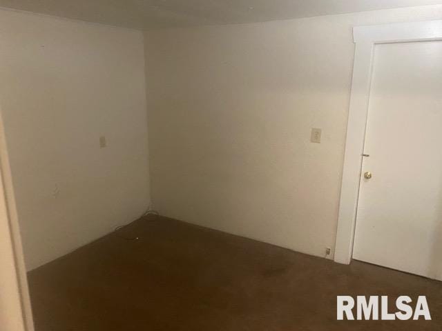 1808 Pine St, Murphysboro, IL 62966 - spare room featuring dark carpet