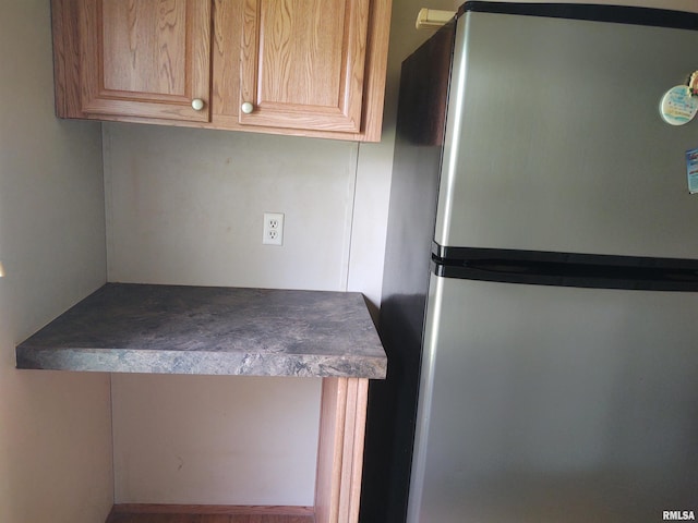 kitchen with stainless steel fridge