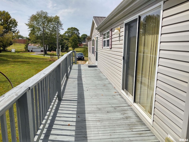 deck featuring a yard