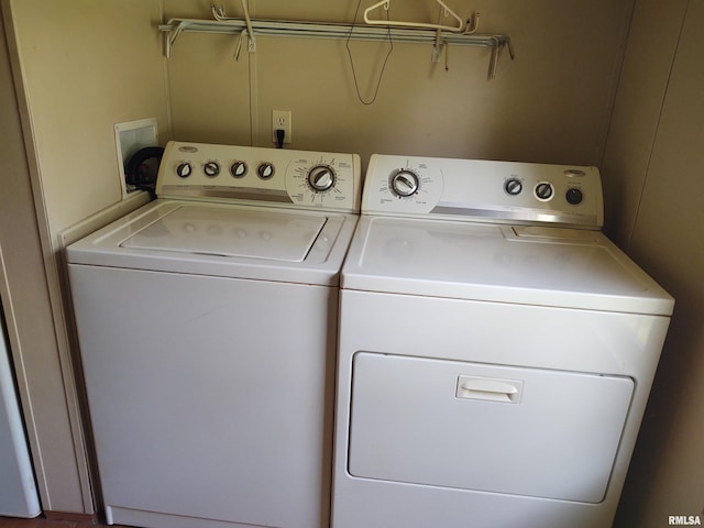 washroom with independent washer and dryer