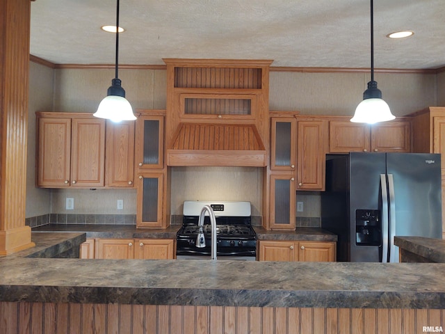 kitchen featuring crown molding, decorative light fixtures, custom exhaust hood, stainless steel appliances, and a textured ceiling