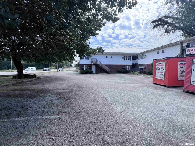 view of road featuring stairs