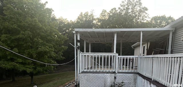 view of side of home featuring a wooden deck