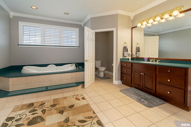 bathroom featuring tile patterned flooring, toilet, vanity, tiled tub, and ornamental molding