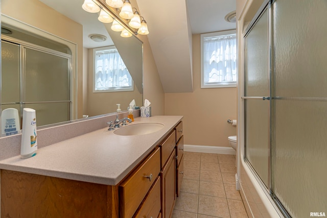 bathroom with tile patterned floors, toilet, and vanity