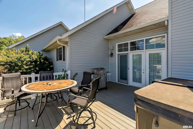 deck featuring area for grilling and french doors