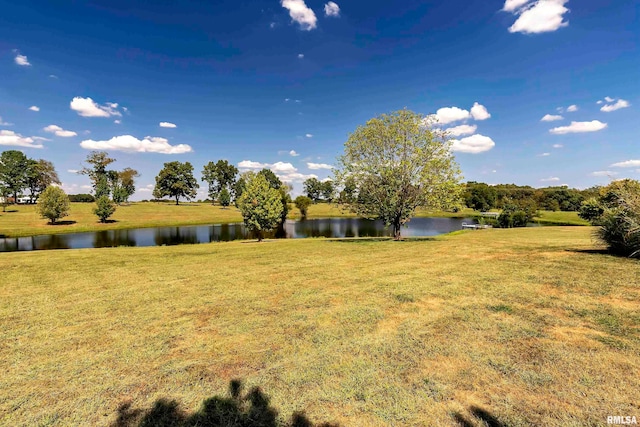 view of yard with a water view