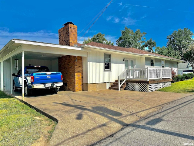 view of front facade with a carport and a porch