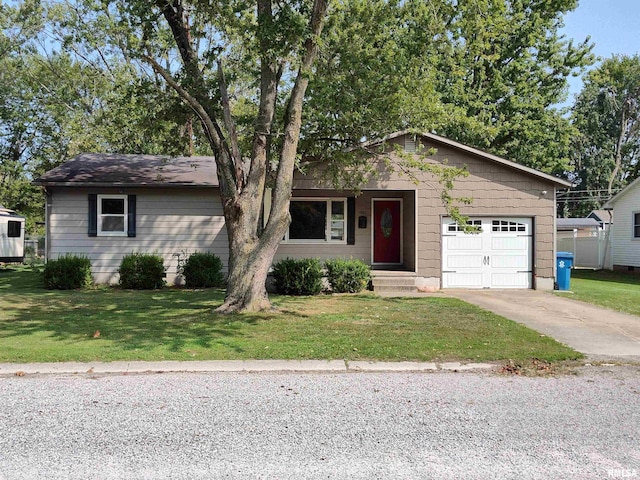 ranch-style home with a garage and a front lawn