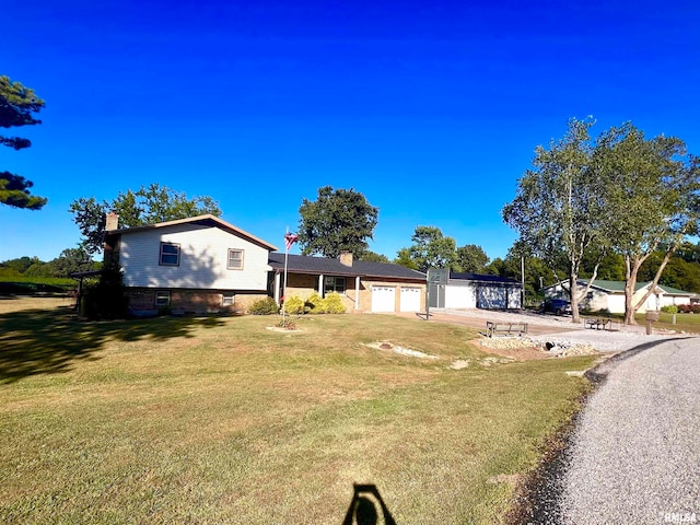 view of yard featuring a garage