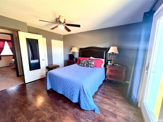 bedroom featuring ceiling fan and dark hardwood / wood-style floors