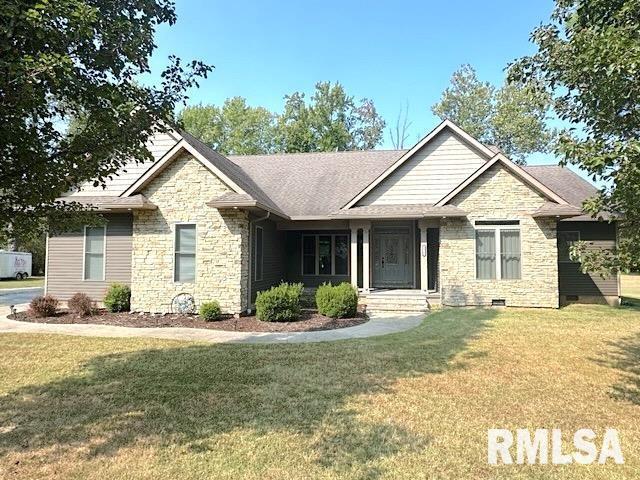 view of front of home with a front yard, stone siding, and crawl space