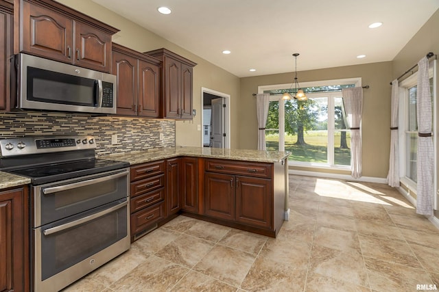 kitchen with light stone counters, recessed lighting, decorative backsplash, appliances with stainless steel finishes, and a peninsula