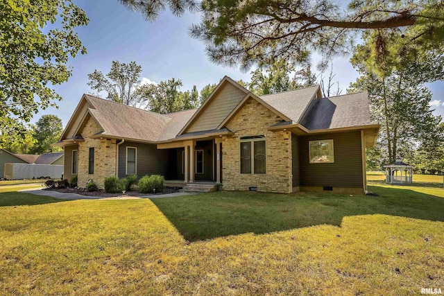 view of front facade featuring stone siding, crawl space, and a front yard