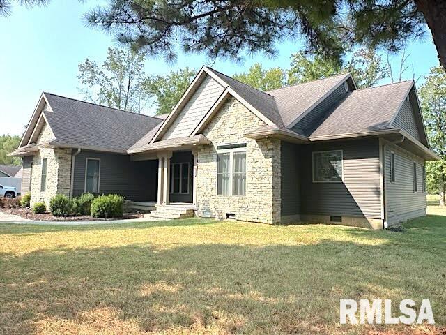 view of front of property with crawl space, stone siding, a shingled roof, and a front lawn