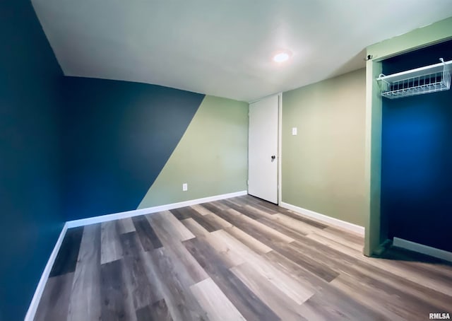 empty room featuring hardwood / wood-style floors