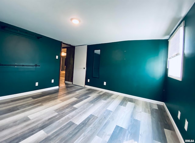 empty room featuring hardwood / wood-style flooring