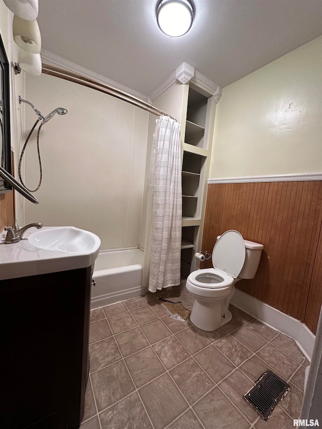 full bathroom featuring shower / bathtub combination with curtain, wood walls, crown molding, toilet, and vanity