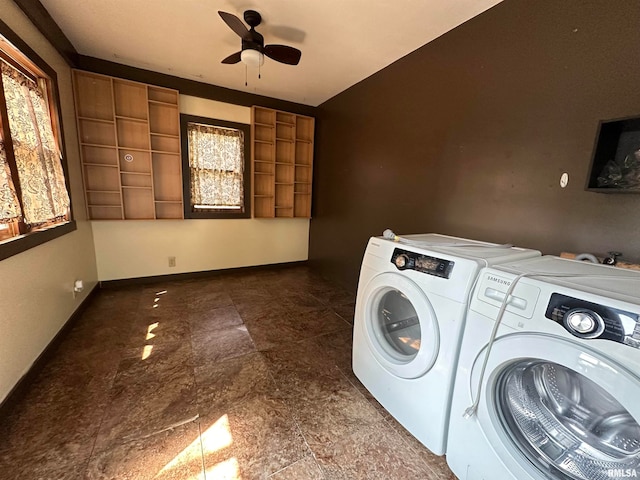 laundry room featuring ceiling fan and separate washer and dryer