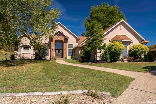 view of front of house with a front lawn