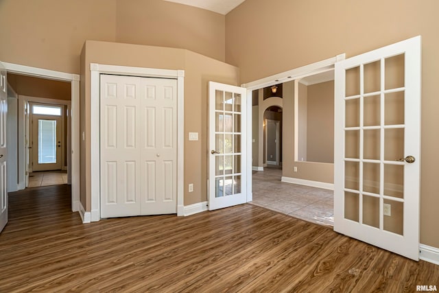 interior space featuring hardwood / wood-style flooring and french doors