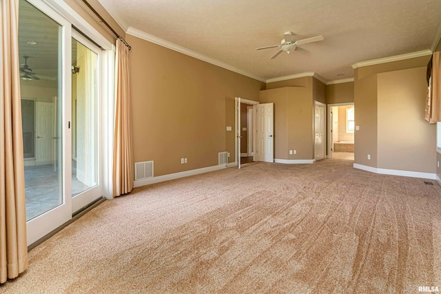 interior space featuring a textured ceiling, crown molding, and ceiling fan