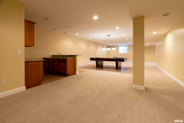 playroom with light colored carpet, wet bar, and billiards