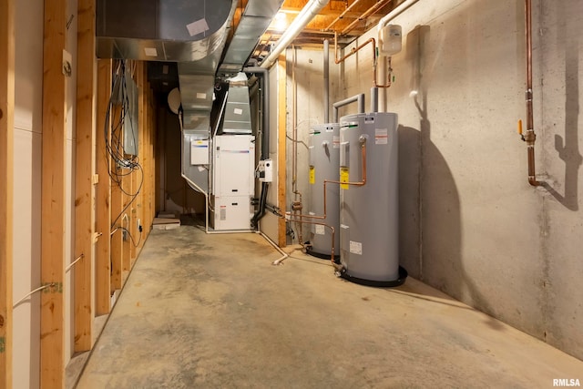 utility room featuring heating unit, water heater, and electric water heater