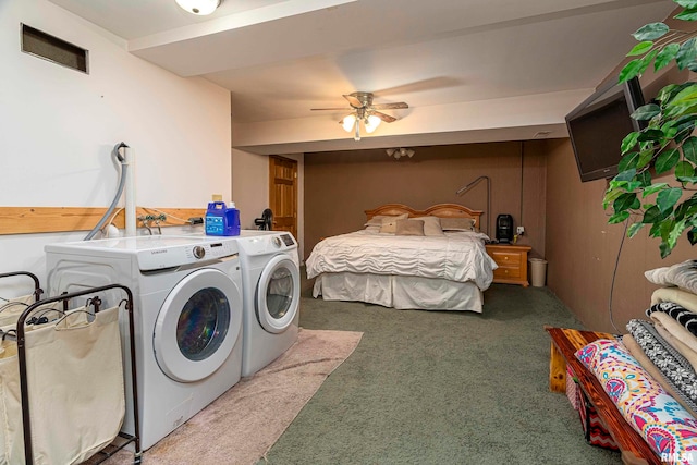 clothes washing area with ceiling fan, carpet flooring, and washing machine and dryer