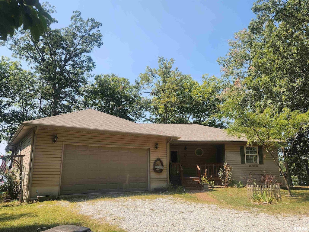 single story home featuring a garage