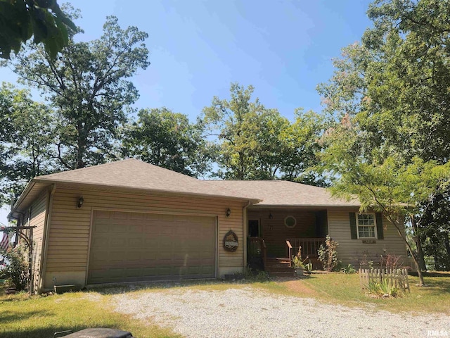 single story home featuring a garage