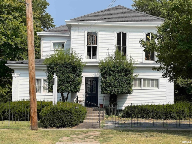 view of front of home with a front yard