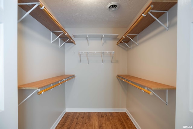 1500 Apache Dr, Marion, IL 62959 - spacious closet featuring wood finished floors