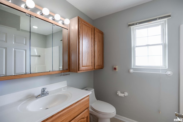 1500 Apache Dr, Marion, IL 62959 - full bathroom featuring toilet, vanity, and a shower