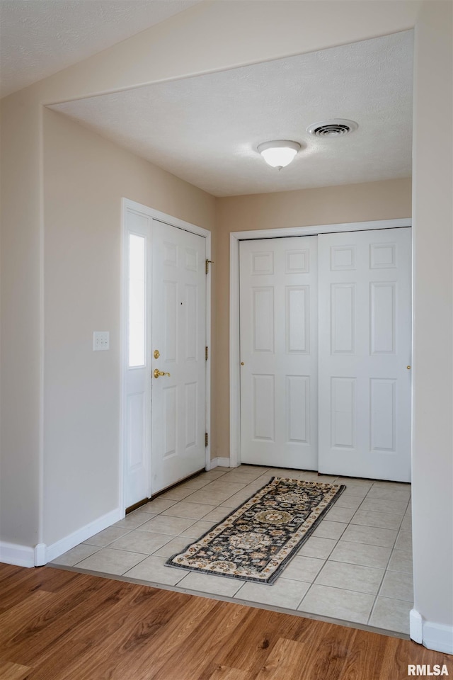 1500 Apache Dr, Marion, IL 62959 - unfurnished room featuring a chandelier, light wood-style floors, a ceiling fan, baseboards, and lofted ceiling