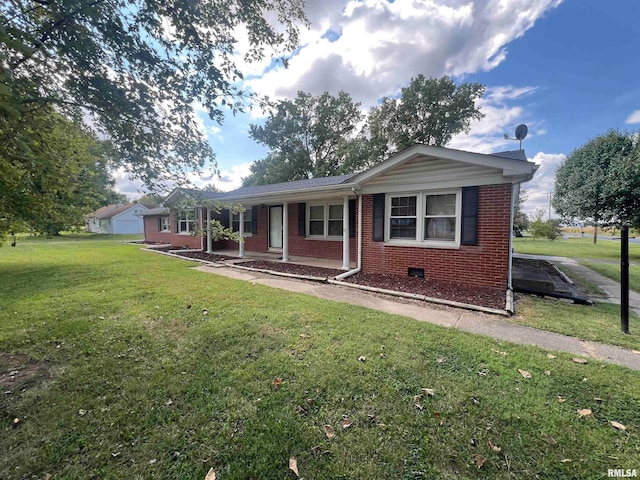 exterior space featuring a lawn and a garage