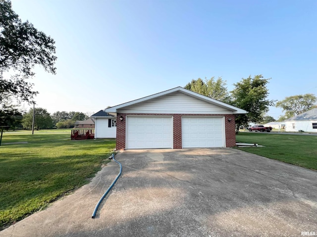 garage with a yard