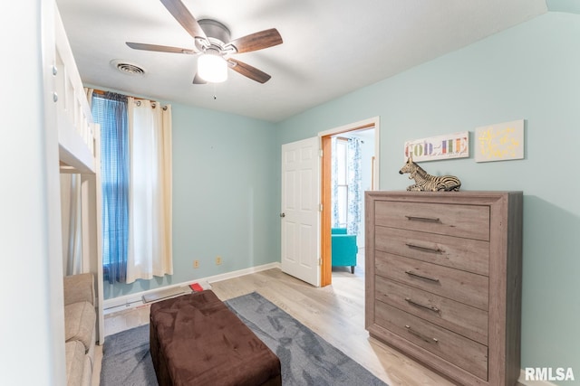 sitting room featuring light wood-type flooring and ceiling fan