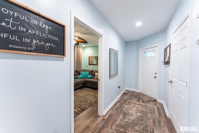 hallway featuring dark wood-type flooring