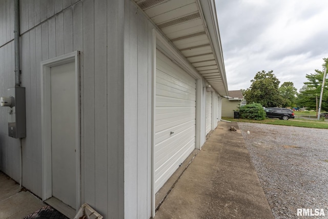 garage featuring wooden walls