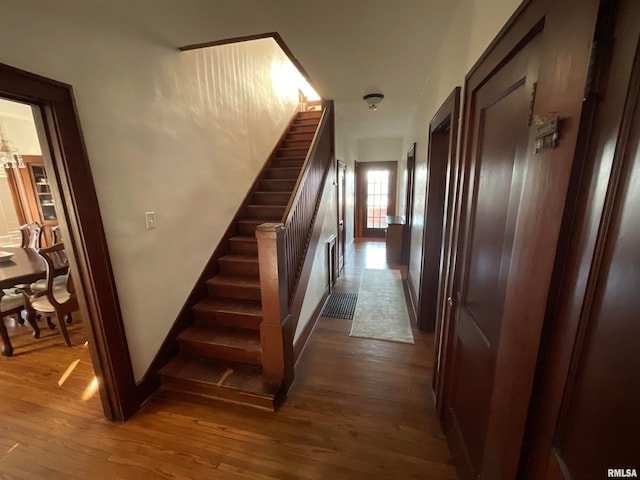 hallway featuring hardwood / wood-style flooring