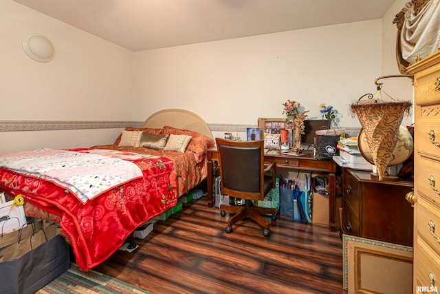 bedroom with wood-type flooring